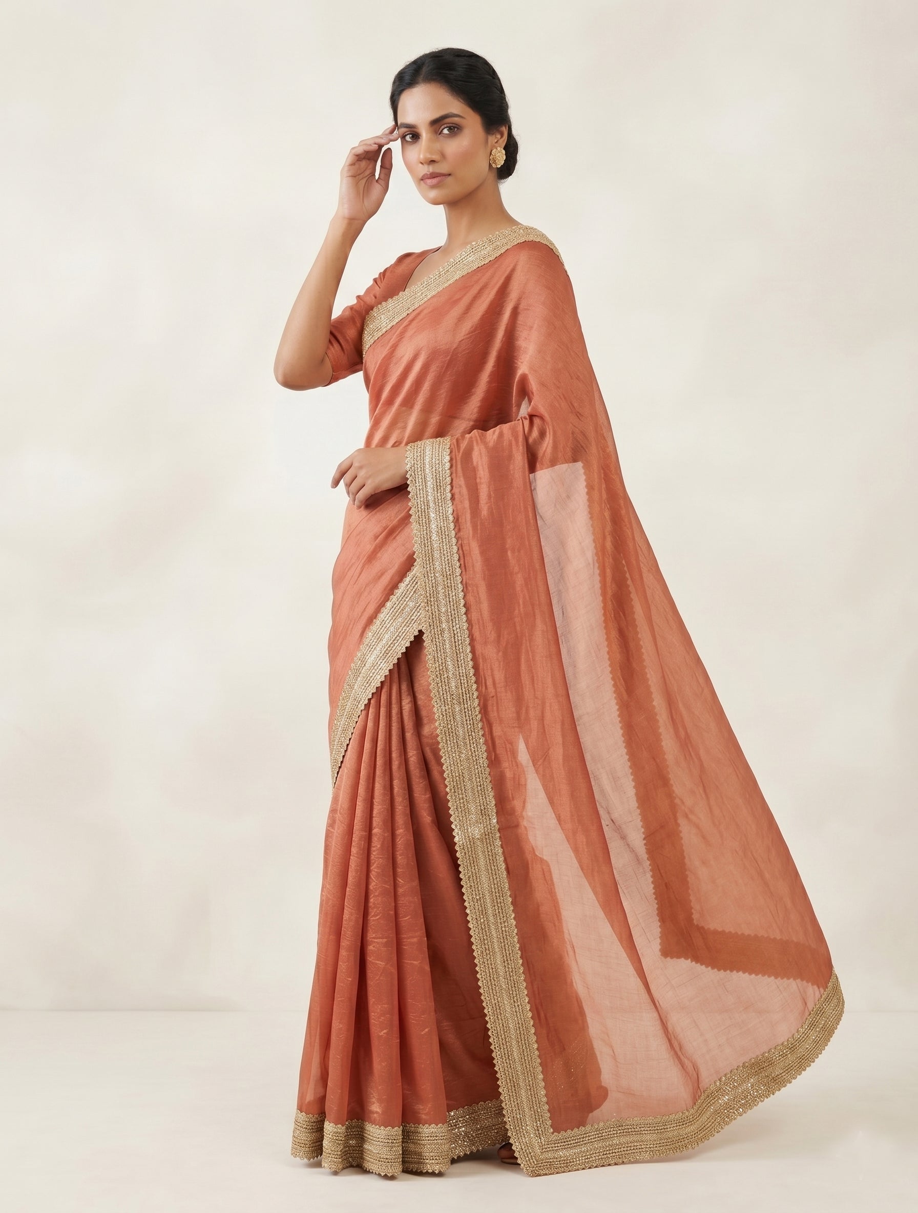 Peach Silk Blend Saree with Elegant Lace Border