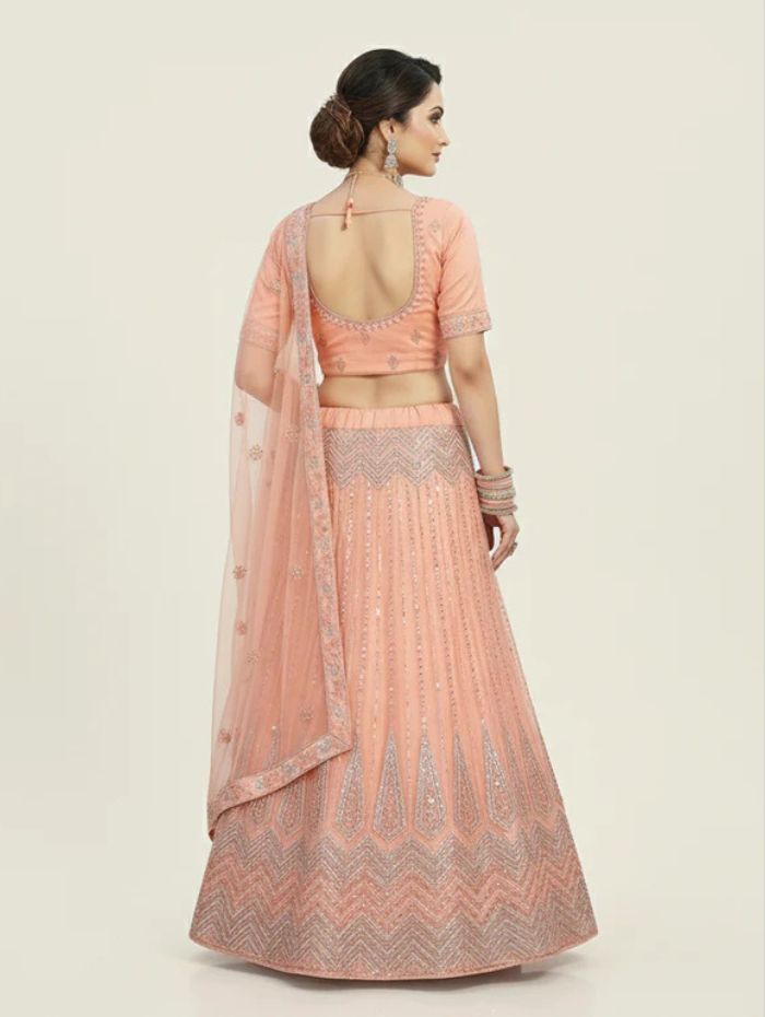 Charming Peach Net Party Wear Lehenga Choli (Unstitched)